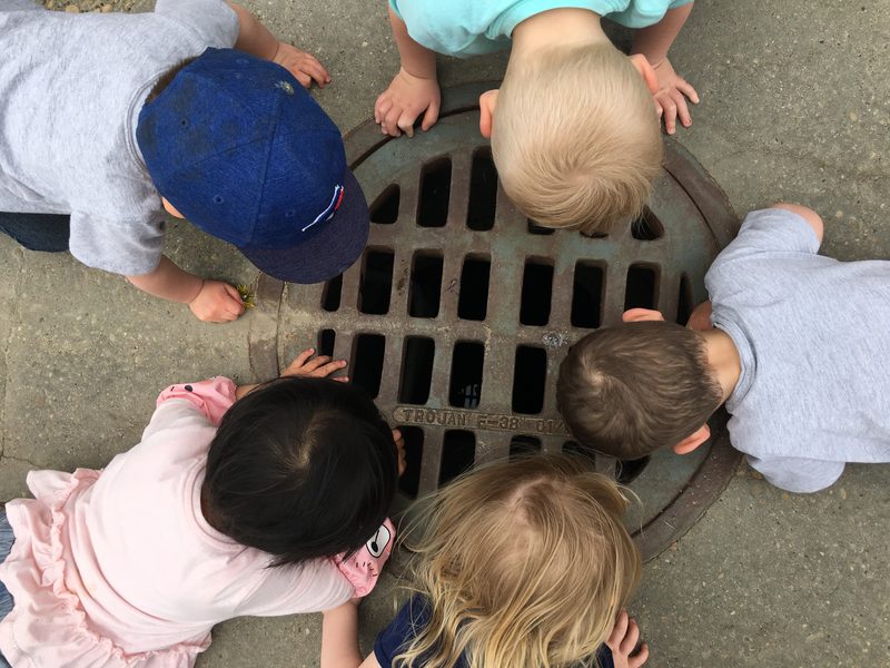 Children exploring the outdoors with curiosity